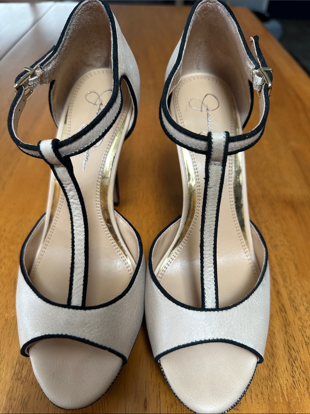 Jessica Simpson cream and black t strap stiletto with glitter heel.